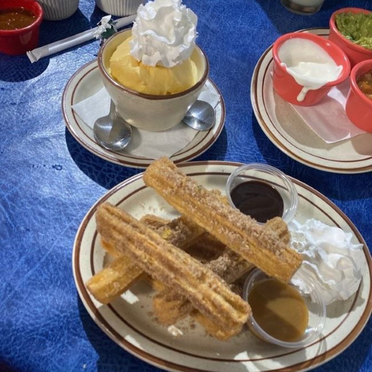 Churros filled with Chocolate & Vanilla Ice Cream